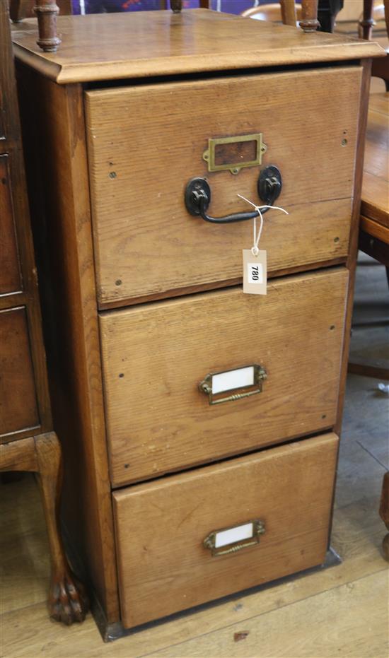 An oak three drawer filing chest W.49cm